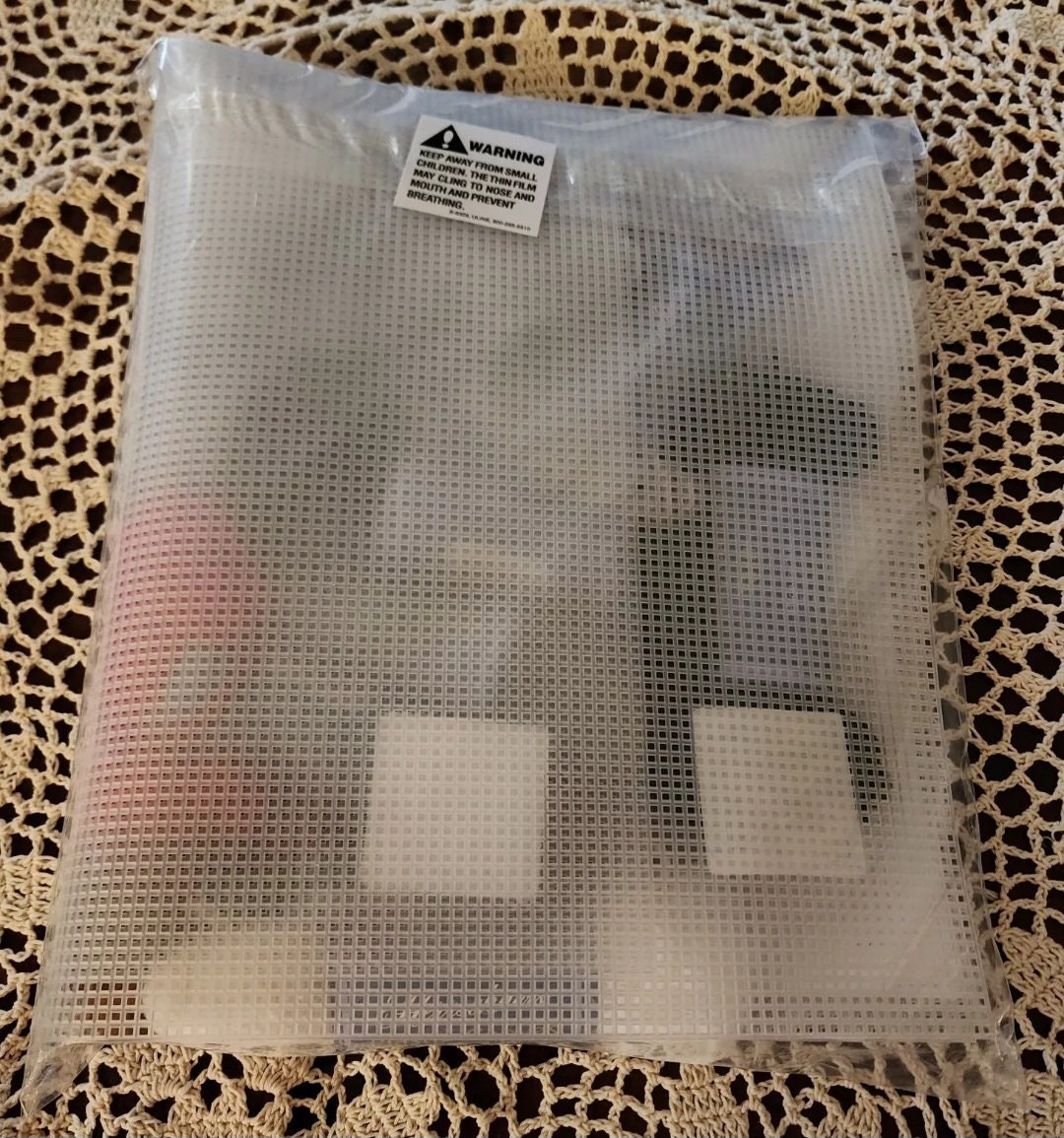 Herrschners Christmas Sled Wall Hanging Plastic Canvas Kit. This is 7