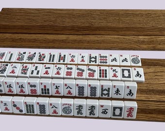 A set of two (2) double Mahjong racks made for two players.