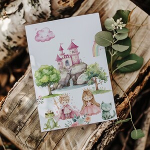 May include: A watercolor illustration of a pink castle with a green tree, a princess in a pink dress, a prince in a blue suit, a frog, and a cat. The illustration is on a white background.