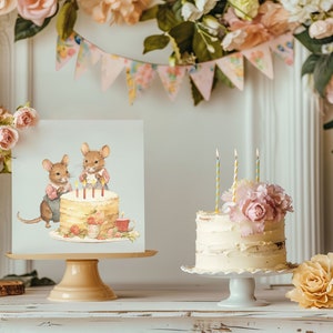 May include: Two mice wearing blue overalls are blowing out candles on a layered cake. The cake is decorated with strawberries and a cup of tea. The image is on a white card with a light blue background.