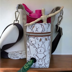 Dog Doodles | ‘H2O2GO Sling’ With a Water Bottle, Cushioned Strap Cover, and Grommet for Easy Access to Dog Waste Bags