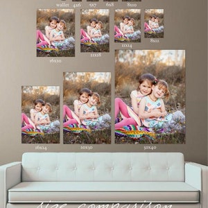 May include: Size comparison chart for photo prints showing different sizes of a photo of two young girls hugging on a blanket in a field. The sizes range from wallet size to 30x40 inches.