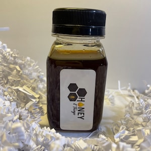 Bottle of Melipona Honey. Natural, Pure Raw And Unfiltered. Stingless Bee Honey.