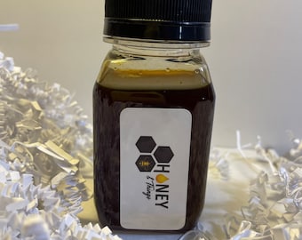 Bottle of Melipona Honey. Natural, Pure Raw And Unfiltered. Stingless Bee Honey.