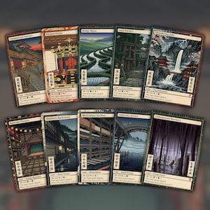 May include: A collection of ten rectangular trading cards featuring illustrated landscapes and architectural scenes. Each card displays a unique title, such as Commercial District or Thundering Falls, along with game text, mana symbols, and Japanese characters.