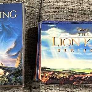 El palco del rey león de Disney, las dos series completas de cromos 1 y 2, menta