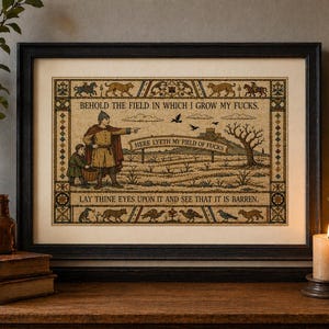 May include: Framed artwork in a black frame, with a medieval-style illustration. The artwork shows a man and a child in a field, with text that reads "BEHOLD THE FIELD IN WHICH I GROW MY FUCKS." and "HERE LYETH MY FIELD OF FUCKS."