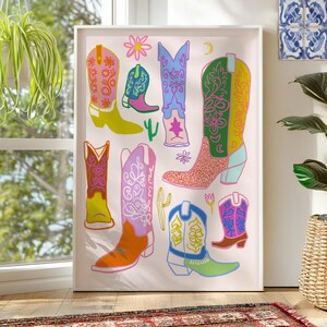 May include: A white background with a colorful illustration of cowboy boots. The boots are decorated with floral patterns, stars, and animal print.