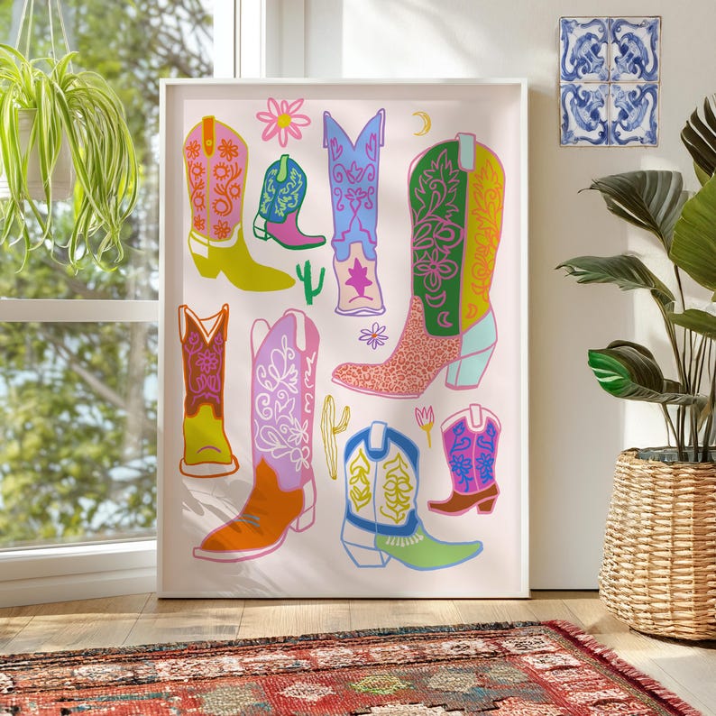 May include: A white background with a colorful illustration of cowboy boots. The boots are decorated with floral patterns, stars, and animal print.