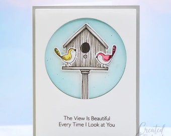 Tarjeta de amor con casita de pájaros: saludo romántico de aniversario