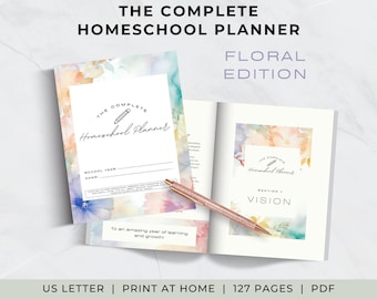 May include: A homeschool planner with a floral watercolor cover featuring the text The Complete Homeschool Planner, Floral Edition. The open planner displays a Vision section and a rose gold pen rests on the pages. It includes 127 pages.
