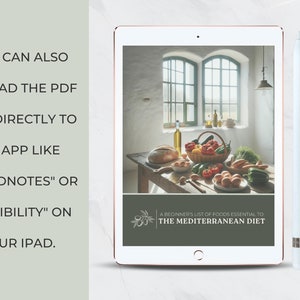 May include: A digital tablet displaying a document titled "A Beginner's List of Foods Essential to The Mediterranean Diet". The document features a photo of a table with various Mediterranean foods, including bread, vegetables, and olive oil. The tablet is on a white surface with a white stylus.
