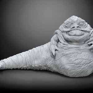 resin figure of jabba with his throne