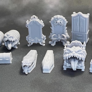 May include: A set of 11 3D printed miniature furniture pieces in a light gray color. The set includes a bed, a dresser, a mirror, a chest, a coffin, and several other pieces.