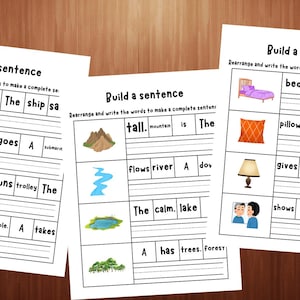 May include: Three educational worksheets titled Build a sentence, featuring rows of illustrations paired with scrambled words. Each row includes a picture of items like a ship, submarine, trolley, taxi, mountain, river, lake, forest, bed, pillow, lamp, or mirror.