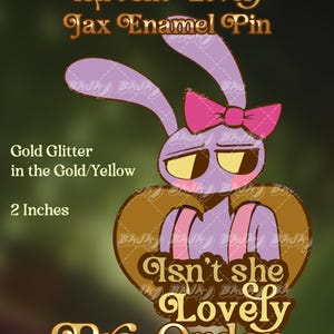 Könnte beinhalten: Ein 5,08 cm großer Emaille-Pin mit einem lila Hasen, einer rosa Schleife, gelben Augen und goldenen Glitzerakzenten. Der Text lautet: Isn't she Lovely Jax Enamel Pin, Gold Glitter in the Gold/Yellow, 2 Inches, Isn't she Lovely Pre-Order.