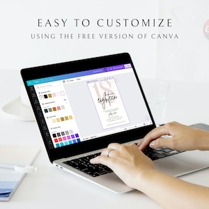 May include: A laptop computer displaying a Canva design template for an 18th birthday party invitation. The design features a pink and white watercolor number 18 with the text "eighteen" in black script. The laptop screen shows a color palette and design tools.