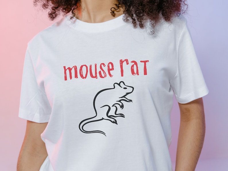 May include: White t-shirt with the text "mouse rat" in red lettering and a black silhouette of a mouse.