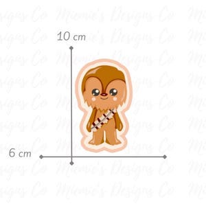 May include: A 6 cm by 10 cm illustration of a cartoon Chewbacca character. The character is brown and has a white bandolier. The character has a friendly expression with large eyes and a small mouth.