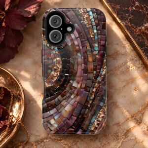 May include: A smartphone case featuring a mosaic pattern of small, rectangular iridescent shell tiles in shades of deep brown, burgundy, and cream, arranged in a swirling, curved design with subtle flashes of blue and green light reflection.