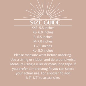 May include: A size guide for wrist measurements in inches.  The guide includes sizes XXS through XL, with corresponding wrist measurements ranging from 5.5 to 8.0 inches.  Instructions for measuring wrist size are included.