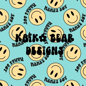 May include: A repeating pattern of smiling faces in light yellow with black eyes and mouths, and the text "MAMA'S BOY" in black, on a light blue background. The text "KATKA & BEAR DESIGNS" is also present.