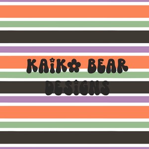 May include: A striped background with the text "KAIK* BEAR DESIGNS" in a retro font.