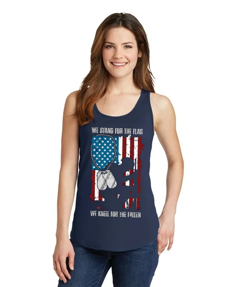 a woman wearing a tank top with an american flag