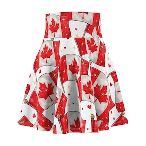 May include: A white skater skirt with a repeating pattern of Canadian flags, red maple leaves, and small red hearts. The flags have red and white stripes and are accented with gold stars.