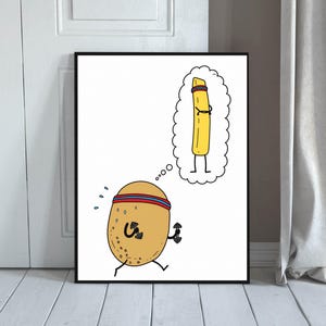 May include: A framed wall art print featuring a tan potato character wearing a red and blue headband while lifting small black dumbbells. The potato has a thought bubble showing a tall, thin yellow french fry with a matching headband.
