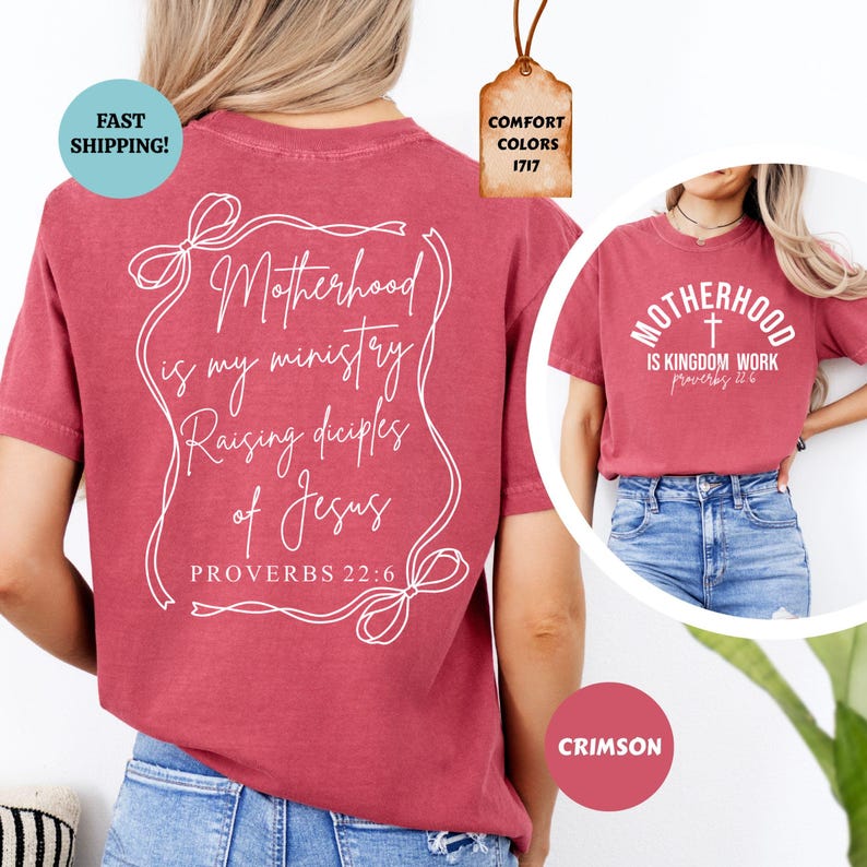 May include: A red t-shirt with a white design that says "Motherhood is my ministry Raising disciples of Jesus Proverbs 22:6". The back of the shirt has a white cross and the text "Motherhood is Kingdom Work Proverbs 12:6".