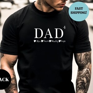 May include: Black t-shirt with the word "DAD" and the number "4" above it. Below the word "DAD" are four hearts with the names "Alice", "Jason", "Maddy", and "Kayson" written below them.