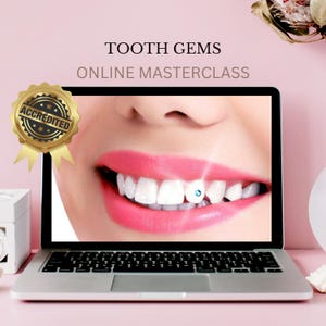 May include: A laptop screen displays a close-up of a smiling mouth with a sparkling blue gem on one tooth. The text "TOOTH GEMS ONLINE MASTERCLASS" is above the image. A gold seal with the word "ACCREDITED" is in the top left corner.
