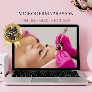 May include: A laptop screen displays a microdermabrasion online masterclass with a video of a person receiving a facial treatment using a silver tool while the practitioner wears bright pink gloves. A gold accredited seal is on the left side.