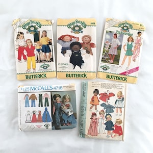 May include: Five vintage sewing patterns for Cabbage Patch Kids dolls. The patterns are for clothes, a play set, and dolls. The patterns are from the brands Butterick and McCall's.