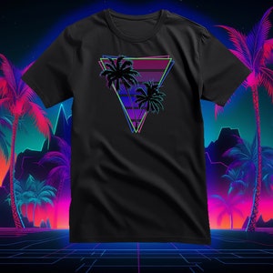 May include: Black t-shirt with a retro-style graphic of palm trees in a triangle with a pink, blue, and purple color scheme.
