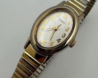 Vintage Timex Classic Womens Womans Gold & Silver Oval Analog Stretch Watch Vintage Timex Classic Womens Womans Gold & Silver Oval  main image 2