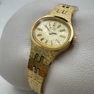 Vintage Seiko Quartz 1400-7389 Gold-Tone Textured Bracelet Watch – 1980s