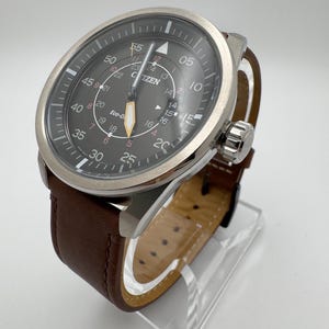 Citizen Eco-Drive Men’s Watch – 44.7mm Stainless Steel, Black Dial, New Leather Band