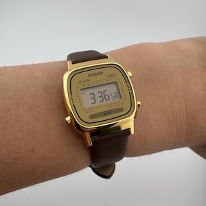 Casio Gold Vintage Digital Watch Women’s Petite Retro Style Gold + brown leather
