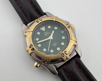 Timex Indiglo Women’s Watch 26mm Green Dial Two Tone Date Quartz