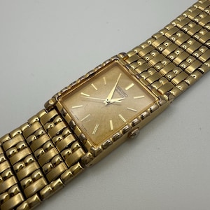 Vintage Seiko Quartz Gold Tone Tank Watch – Rectangular Case, 24mm, Fresh Battery, 7N01