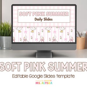 May include: A computer monitor displays a pink and white presentation titled "SOFT PINK SUMMER Daily Slides." The design features duck illustrations and the text "Editable Google Slides template" below. A small potted plant and pencils are visible.
