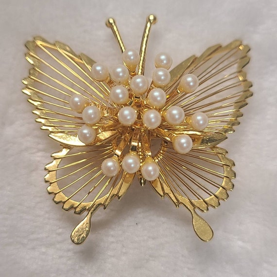 Vintage Monet Gold Tone Faux Pearl Butterfly Brooc