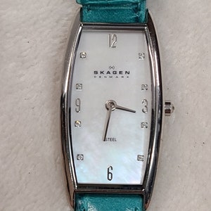 Skagen Women&#39;s Silver Tone Watch With Mother Of Pearl Face & Teal Band N519SSLTO