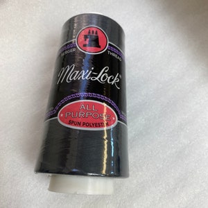 May include: A spool of black Maxi-Lock All Purpose Spun Polyester thread for serger and sewing machines.