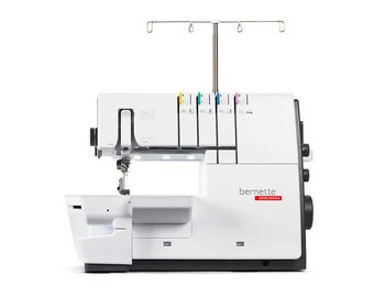May include: A white Bernette b62 overlocker sewing machine with a Swiss design label. The machine has a thread stand, and colored thread guides. The machine has a white body with black accents and a silver needle.