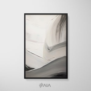 May include: Abstract art print in a black frame. The artwork features a blend of white, gray, and black brushstrokes, creating a sense of movement and depth. The painting has a modern aesthetic, suitable for home decor.