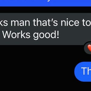 May include: Screenshot of a text message conversation on a black background. One message reads "Thanks man that's nice to have! Works good!" Another message says "Thank you!" A red heart emoji is visible.