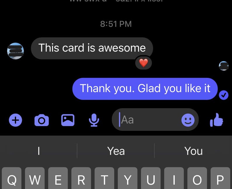 May include: Screenshot of a mobile phone screen displaying a text message conversation. The messages are in white and blue bubbles against a black background. The text reads "This card is awesome" and "Thank you. Glad you like it."